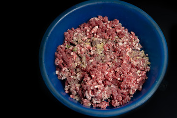 The minced meat lies in the dishes