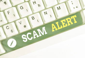 Writing note showing Scam Alert. Business concept for unsolicited email that claims the prospect of...