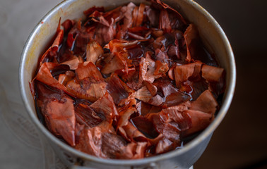 Boiling onion peels for painting eggs for Easter