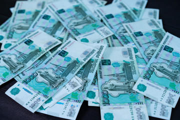 Bundle of money on wooden background