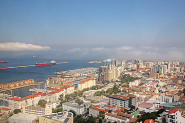 View from the Rock of the city below, the commercial port & also the coast of Africa in the far distance, Gibraltar.