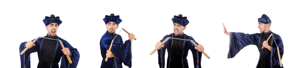 Martial arts master with nunchucks on white