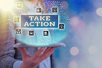 Conceptual hand writing showing Take Action. Concept meaning to do somethingoract in order to get a...