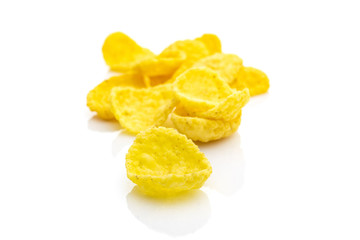 Cereals breakfast. Healthy Superfood corn flakes isolated on white background. Healthy eating, dieting and detoxication concept, space for text. Macro close-up shot.