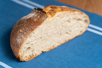 Homemade boule (round loaf) of freshly baked sourdough bread