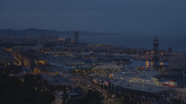 Barcelona's Night Skyline. The city that actually sleeps at night with the Mediterranean Sea in the Background, 4K