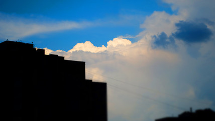 Storm clouds overtook the blue sky before the rain