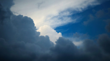 Fototapeta na wymiar Storm clouds overtook the blue sky before the rain