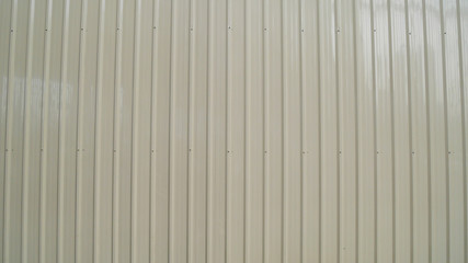 White vintage corrugated metal or zinc texture surface or galvanize steel in the vertical line background or texture