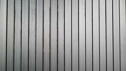 White vintage corrugated metal or zinc texture surface or galvanize steel in the vertical line background or texture