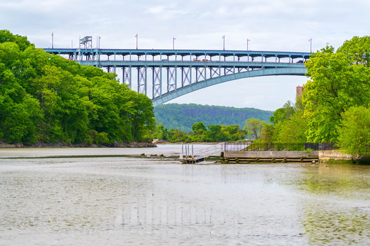 Scenic Summer Day Image of The Henry Hudson Bridge Located in Inwood Hill Park Manhattan.