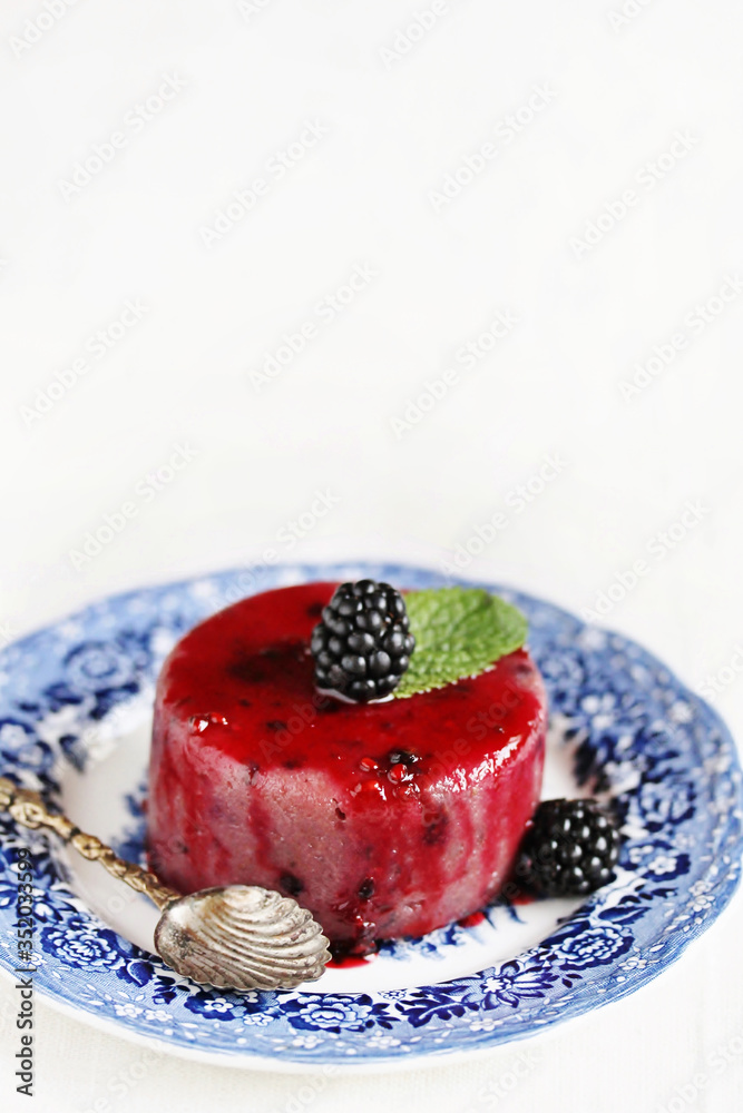 Canvas Prints semolina pudding with blackberries. Soft focus. Copy Space