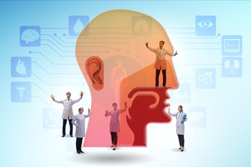 Otolaryngology concept with doctors treating patient