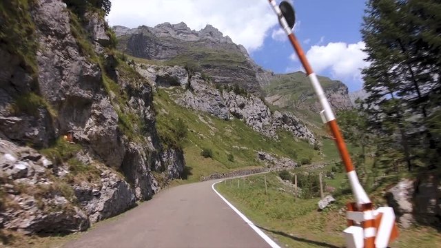 KLAUSENPASS, SWITZERLAND - AUGUST 6, 2018: The Klausen Pass - 1948 m - is a pass crossing in the Swiss canton of Uri. The pass leads from Altdorf through the Schachental over the pass to Linthal