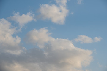 Fototapeta premium Sunny cloudscape blue sky with white cumulus clouds cloudscape. Beautiful nature background backdrop sky.