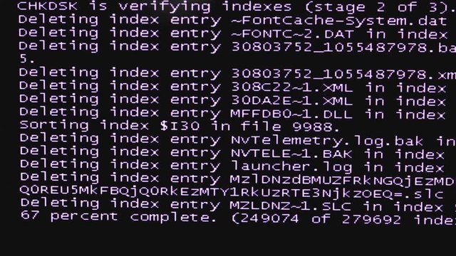 Black screen monitor showing binary code background
