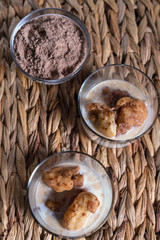 eggs of milk, typical dessert of Extremadura, fried dough with milk, cinnamon and cocoa sprinkled
