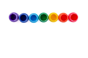 Jars with rainbow colors isolated on white background. Top view.