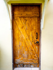 New brown wooden door in house interior