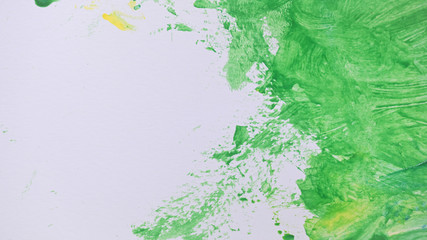 abstract image green and yellow watercolor paint on white paper background