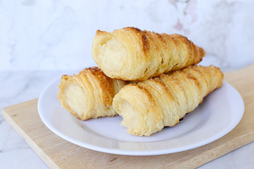 Horn pastry cake with vla or vanilla custard filling. Homemade cumcum cake filled with cream