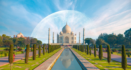 Taj Mahal at sunrise with full moon - Agra, India  