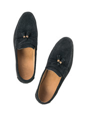 A pair of men's suede loafers isolated on a white background. The view from the top.