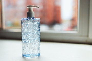 Fototapeta na wymiar Bottle of hand sanitizer, antimicrobial liquid gel, antibacterial hygiene
