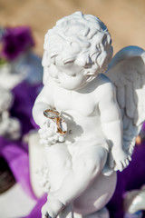 Wedding rings close up decorated nautical with accessories for tropical caribbean outdoor wedding ceremony on the sandy beach in Dominican republic, Punta Cana
