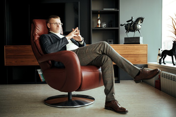 boss in a leather chair
