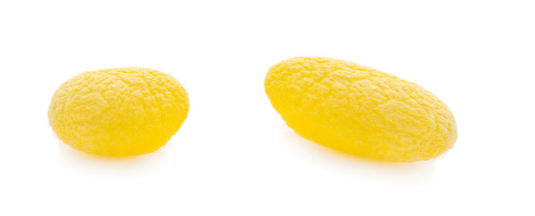 yellow thai silkworm cocoons pile an isolated on white background.