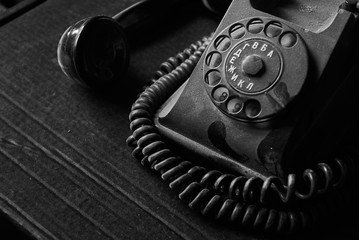 vintage black old telephone handset on black background