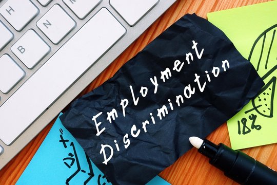 Employment Discrimination Inscription On The Piece Of Paper.