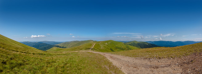 Panoramic view of Carpathian mountains on summer sunny day