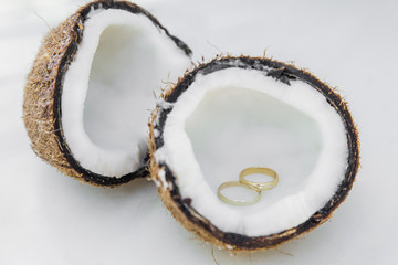 Wedding rings close up decorated nautical with accessories for tropical caribbean outdoor wedding ceremony on the sandy beach in Dominican republic, Punta Cana