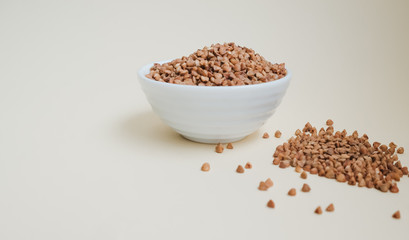 raw buckwheat in a cup, healthy food