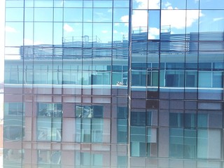 Plakat Building Reflecting In Curtain Wall