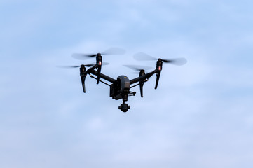 China, Heihe, July 2019: a drone in the air against a blue sky