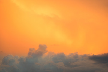 Orange sky and white clouds