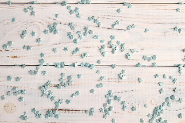 Blue stars on a wooden background