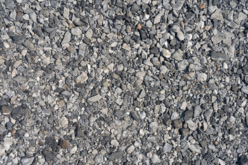 small rock, cracked rock background texture.