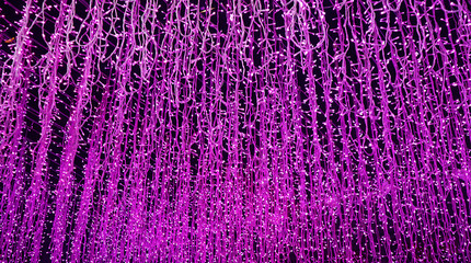 Vivid Purple Illuminated Ceiling String Lights for Background or Banner	