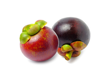 Tropical fruits. Mangosteens Queen of fruits, mangosteen and another cut in half isolated on white with clipping path