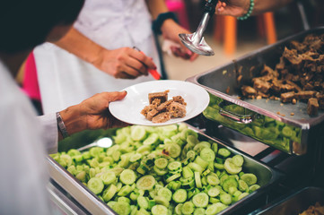 Feeding to the poor to hands of a beggar : concept of feeding food for beggar