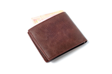 Side view of isolated genuine leather brown with many banknotes on white background. Cash concept.