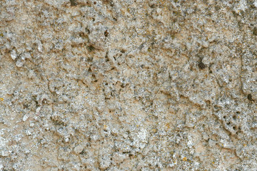 Grey rough concrete texture, weathered stucco surface pattern.