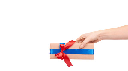 Gift box wrapped with brown paper. Isolated.