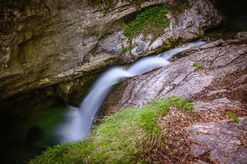 Beautiful Sum or Mostnica waterfall on the end of Voje valley in Slovenia