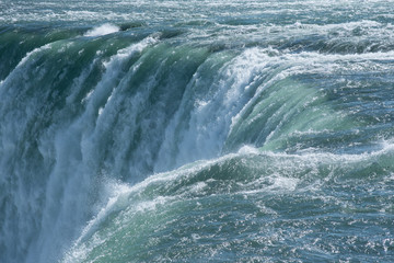 water flowing from the waterfall