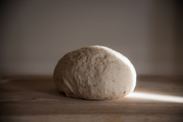 dough with light beam on table